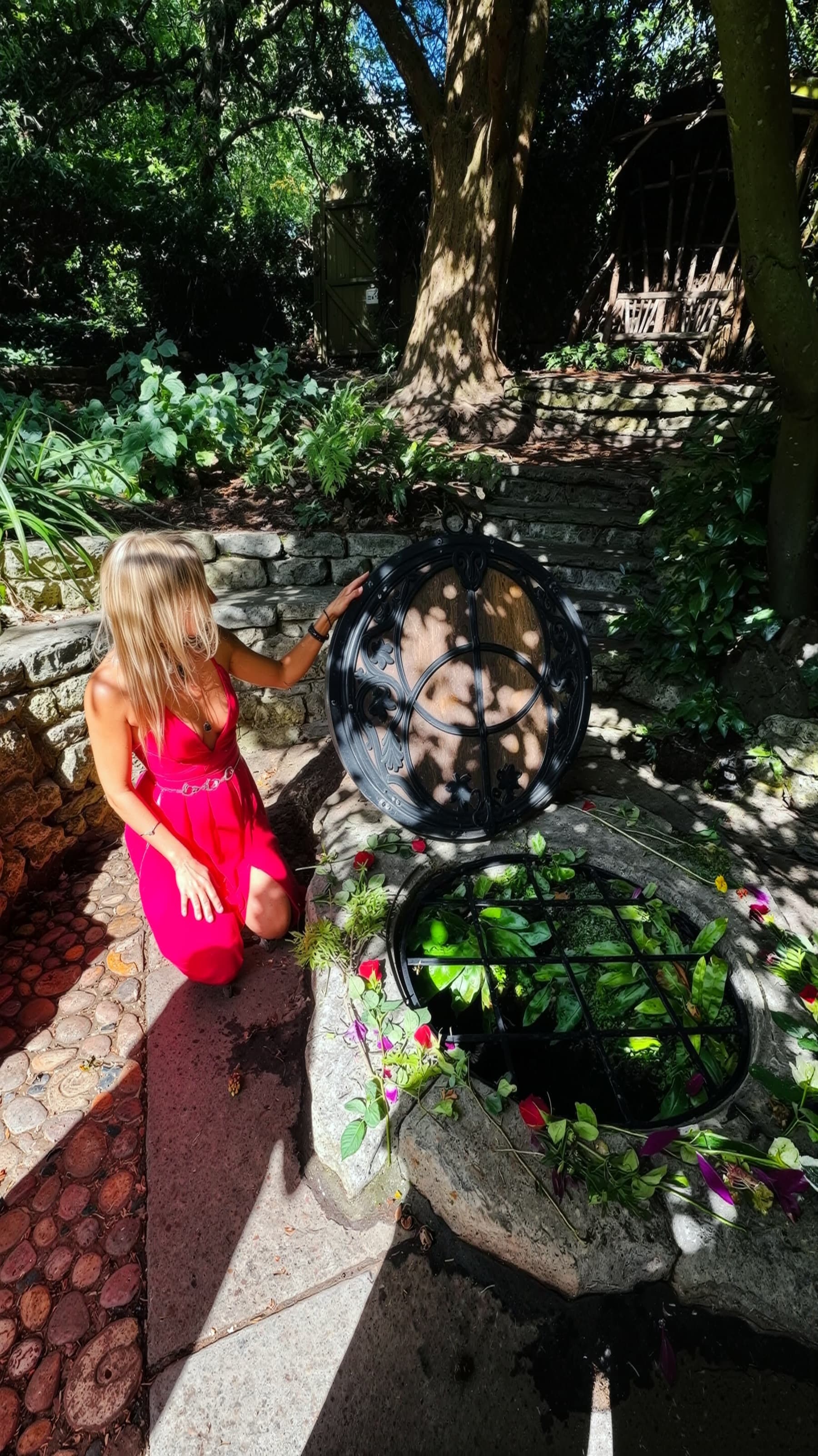 Lina at sacred garden well