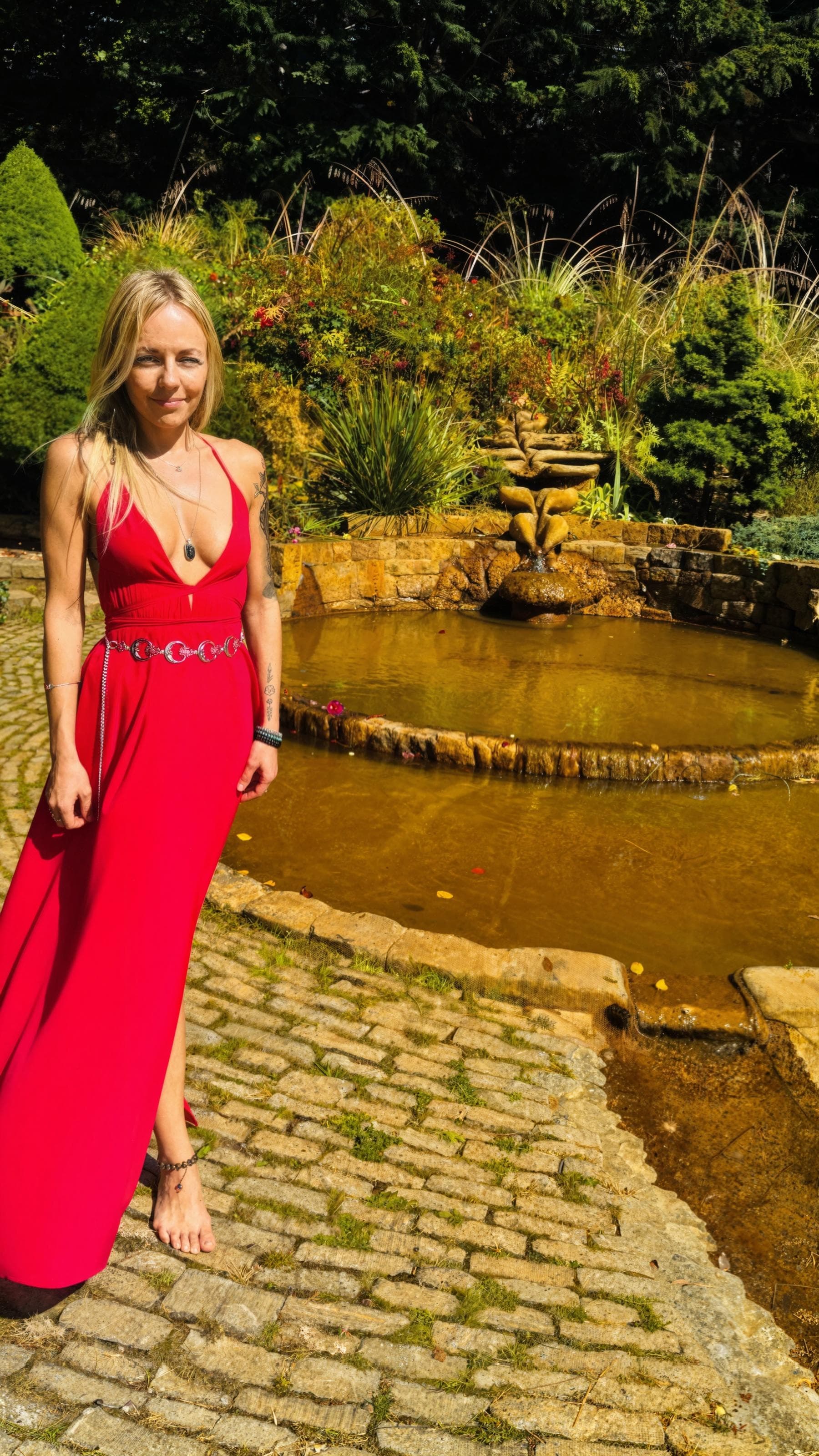 Lina in sacred garden fountain